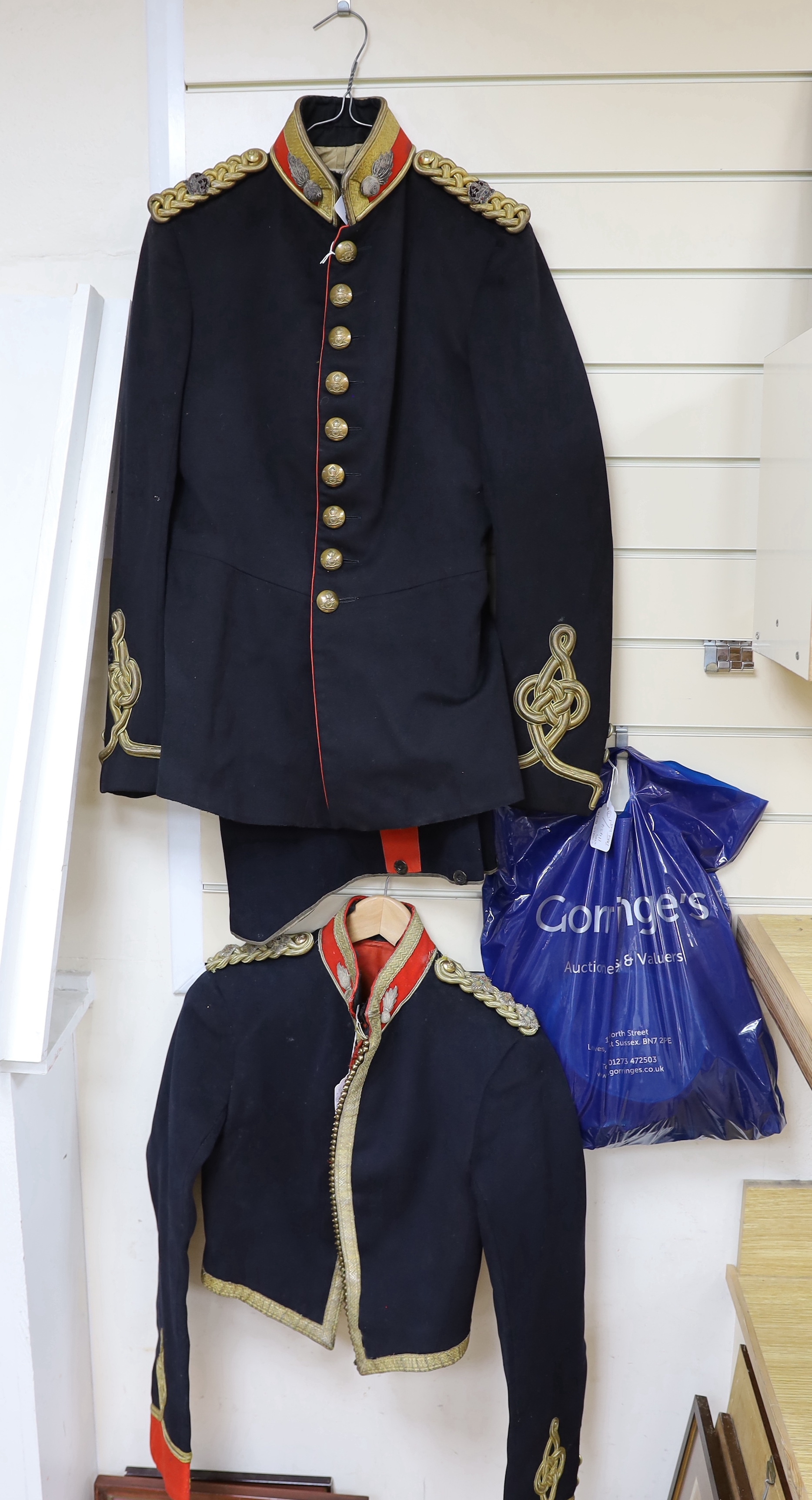 An early 20th century Royal Artillery officers dress uniform, comprising a jacket and trousers, both with original maker’s labels for J. Daniels and Co., with owner’s name ‘Major G.H. Tristram R.A.’ added in pen, a Mess